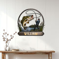 Bass fishing wall sign displayed on a light paneled wall above a console table