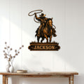 Cowboy and horse metal wall sign displayed on a bright farmhouse-style interior wall