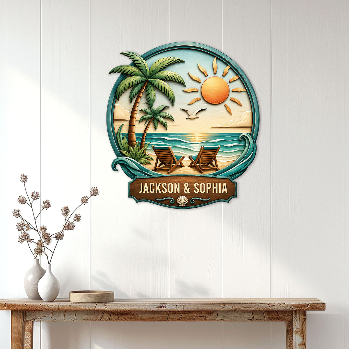 Beach house wall decor displayed on a light paneled wall above a console table in a coastal entryway