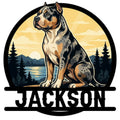 American Bully metal sign featuring a seated tri-color dog against a mountain lake and forest landscape