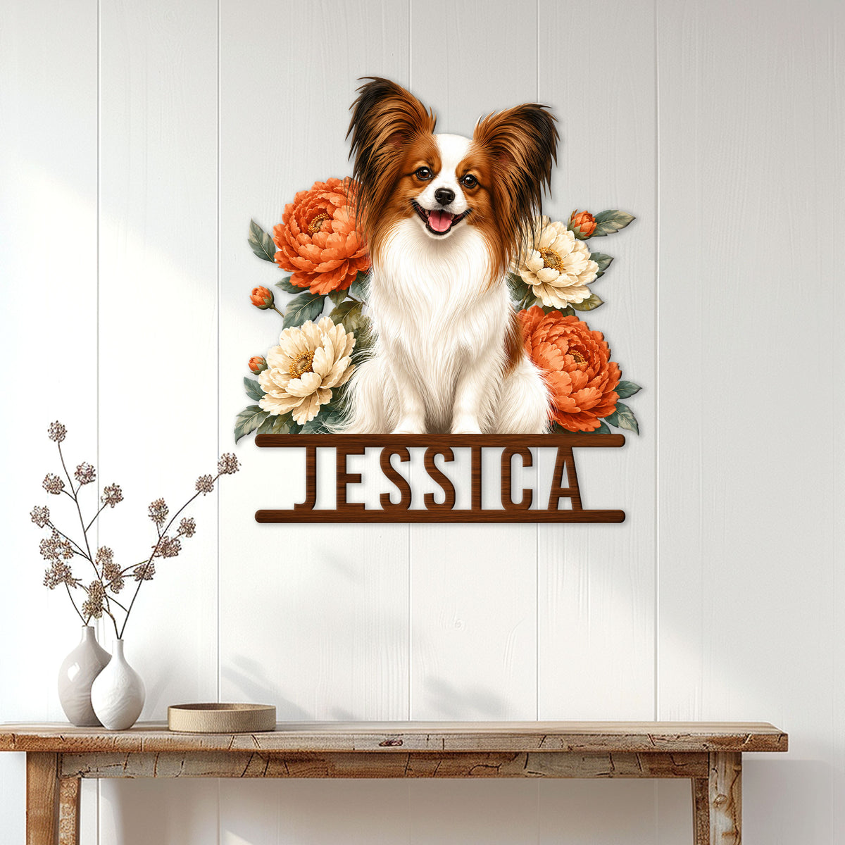 Papillon dog wall sign displayed on a light wood-paneled wall above a console table