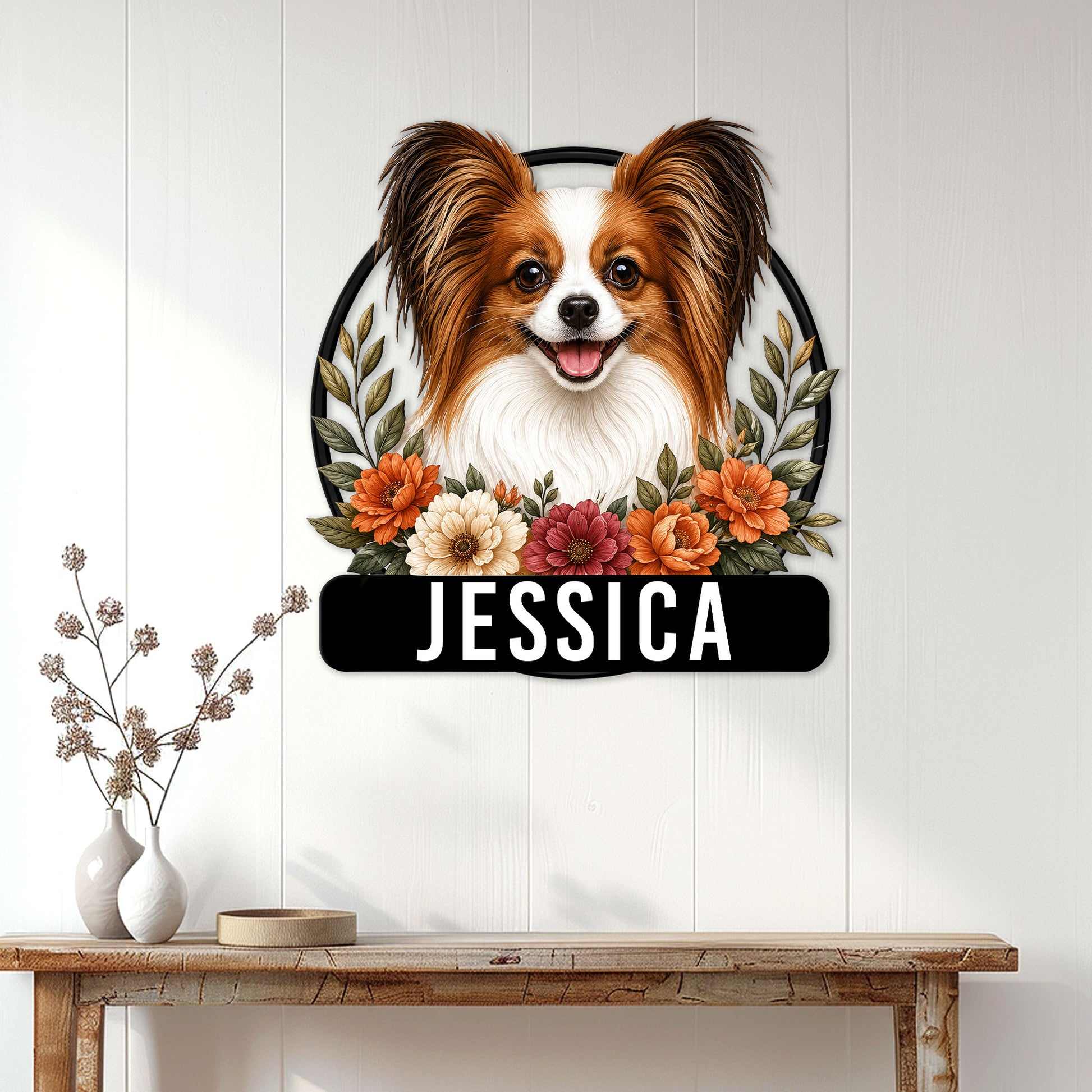 Papillon dog wall sign displayed above a console table in a bright, modern home entryway