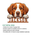 Cut metal Brittany Spaniel sign showcasing a detailed brown-and-white spaniel portrait with paws over the lower design