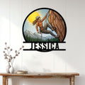 Rock climber metal wall sign displayed on a white paneled wall above a rustic console table