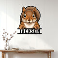 Squirrel metal wall sign displayed above a console table in a bright, modern home interior