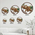 Sloth metal sign size guide showing several round size options displayed on a living room wall