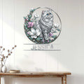Persian cat metal wall sign displayed above a console table in a bright, modern home
