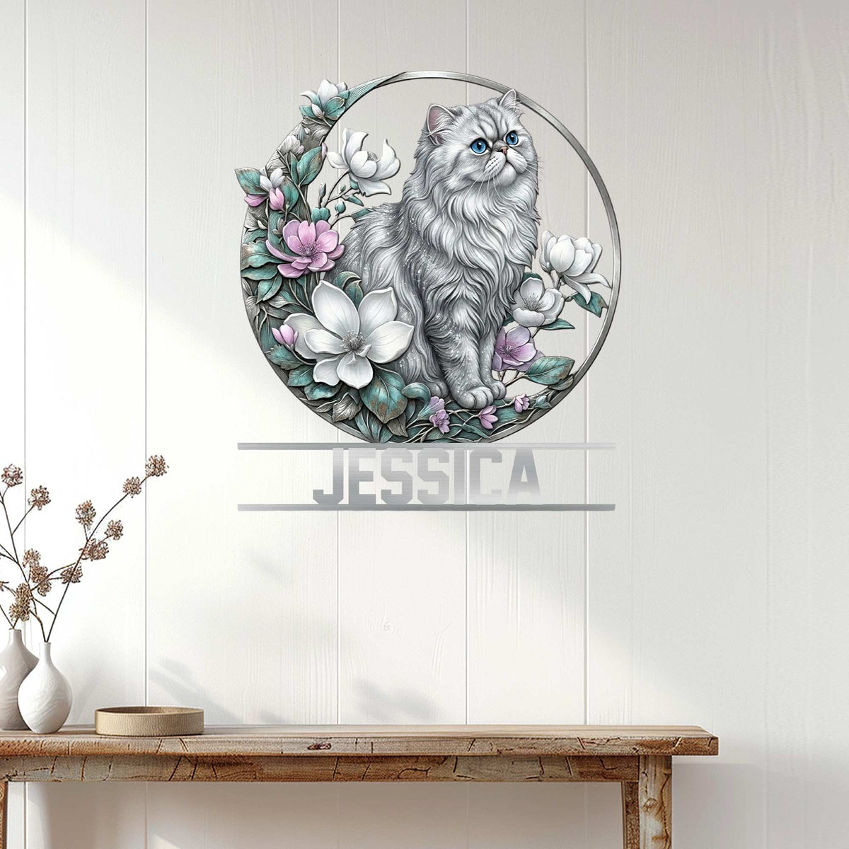 Persian cat metal wall sign displayed above a console table in a bright, modern home