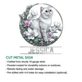 Cut metal sign featuring an Exotic Shorthair cat surrounded by pink and white flowers