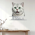 British Shorthair cat metal sign displayed as stylish wall decor above a console table