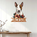 Bull Terrier floral metal sign displayed as wall decor against a bright white wood-paneled interior
