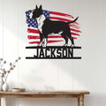 Patriotic Bull Terrier wall sign displayed on a bright white paneled wall above a console table