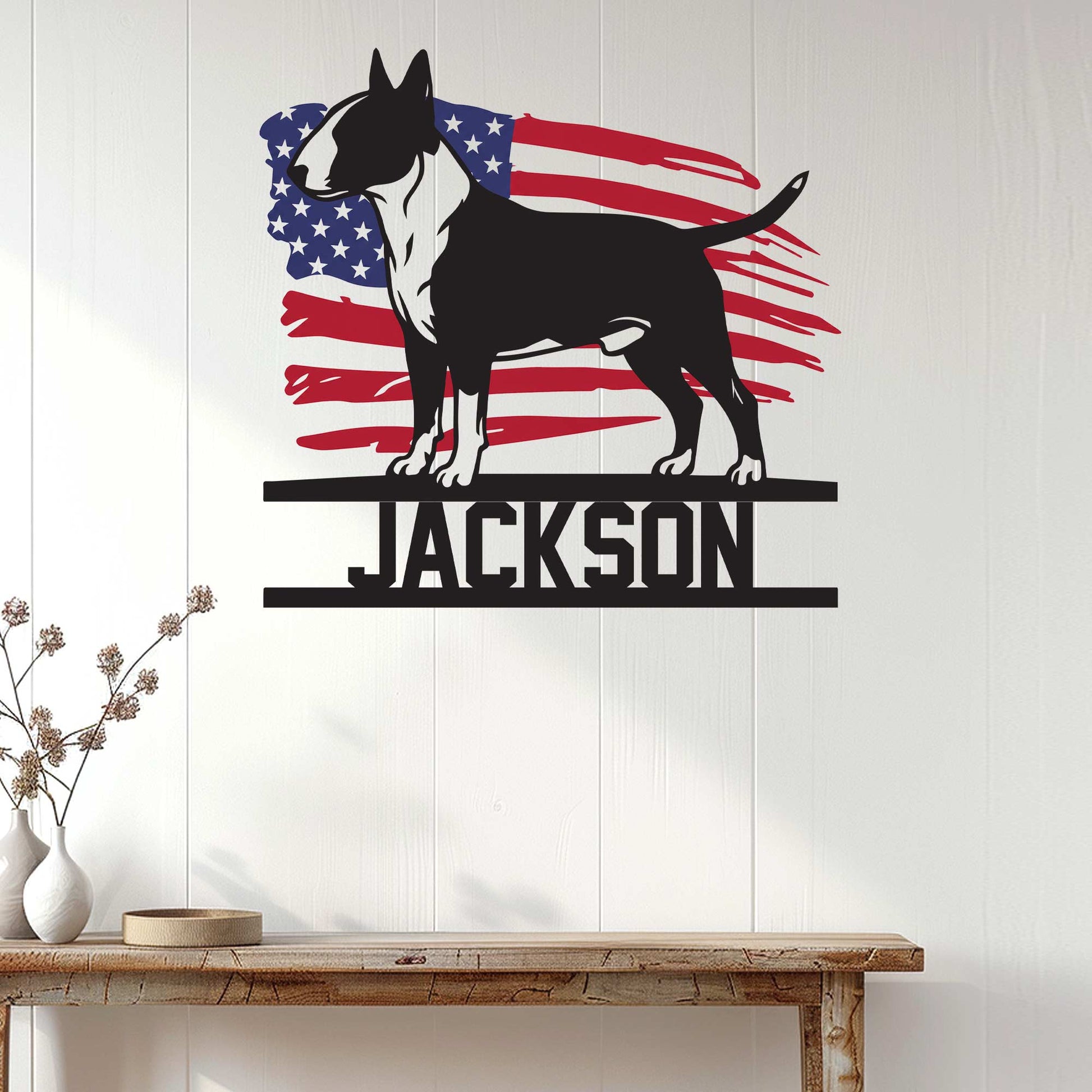 Patriotic Bull Terrier wall sign displayed on a bright white paneled wall above a console table