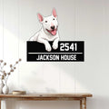 Bull Terrier wall sign displayed on a light wood-paneled wall above a console table