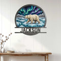 Polar bear wall sign displayed above a console table, featuring ice floes, snowy mountains, and northern lights
