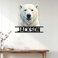 Custom polar bear wall sign displayed on a light wood-paneled wall above a console table