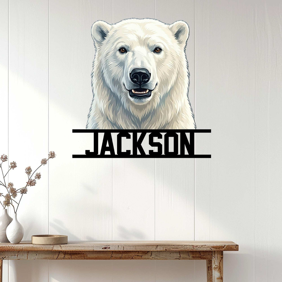 Custom polar bear wall sign displayed on a light wood-paneled wall above a console table