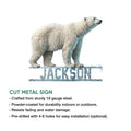 Cut metal sign featuring a snow-dusted polar bear and details about indoor or outdoor display