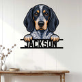 Bluetick Coonhound metal wall sign displayed on a light wood-paneled wall above a console table