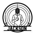 Fencing metal sign featuring a masked fencer holding a foil within concentric target rings