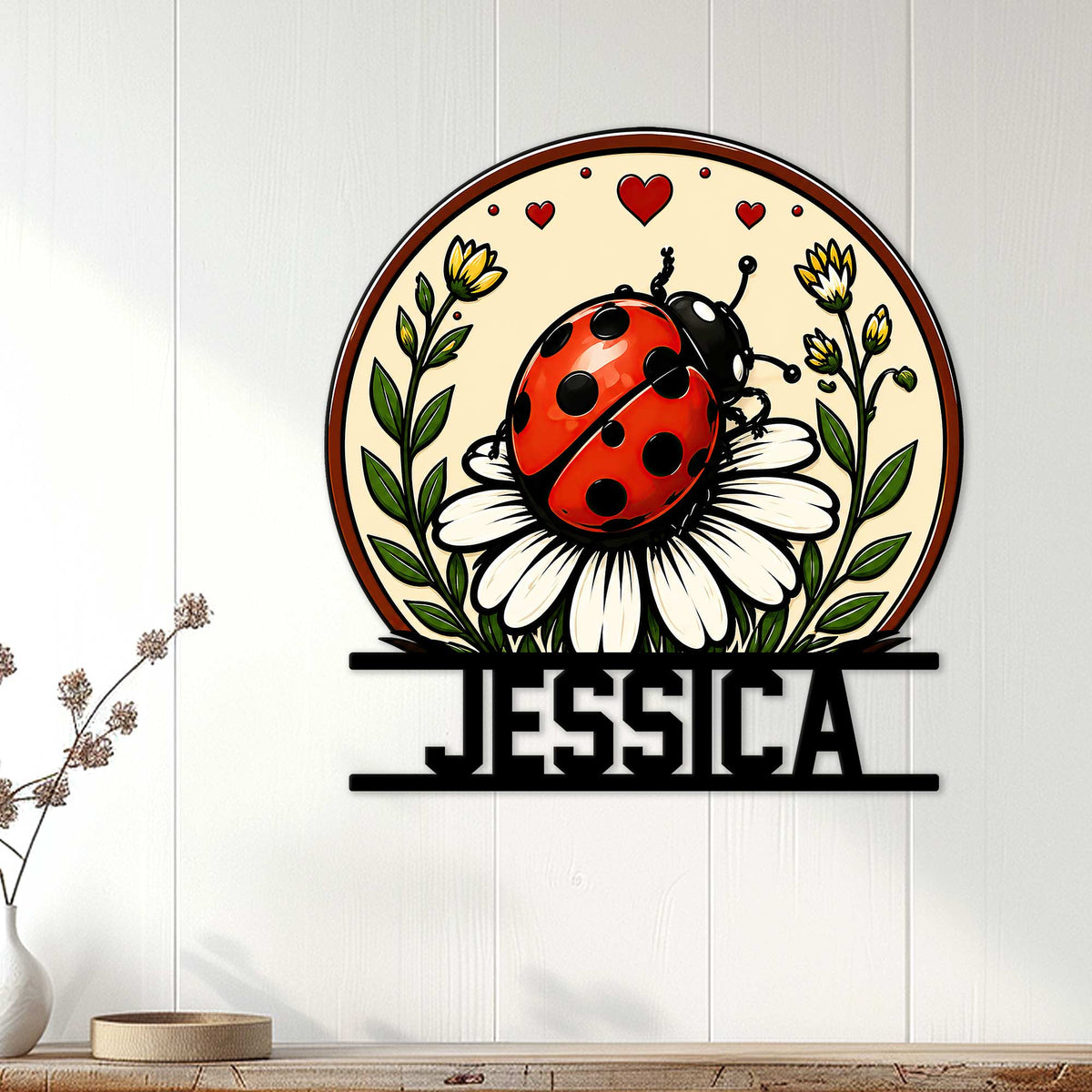 Ladybug garden wall sign displayed on white paneling above a console with floral home decor