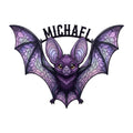 Purple bat metal sign featuring a cute wide-winged bat with intricate stained-glass style wing details