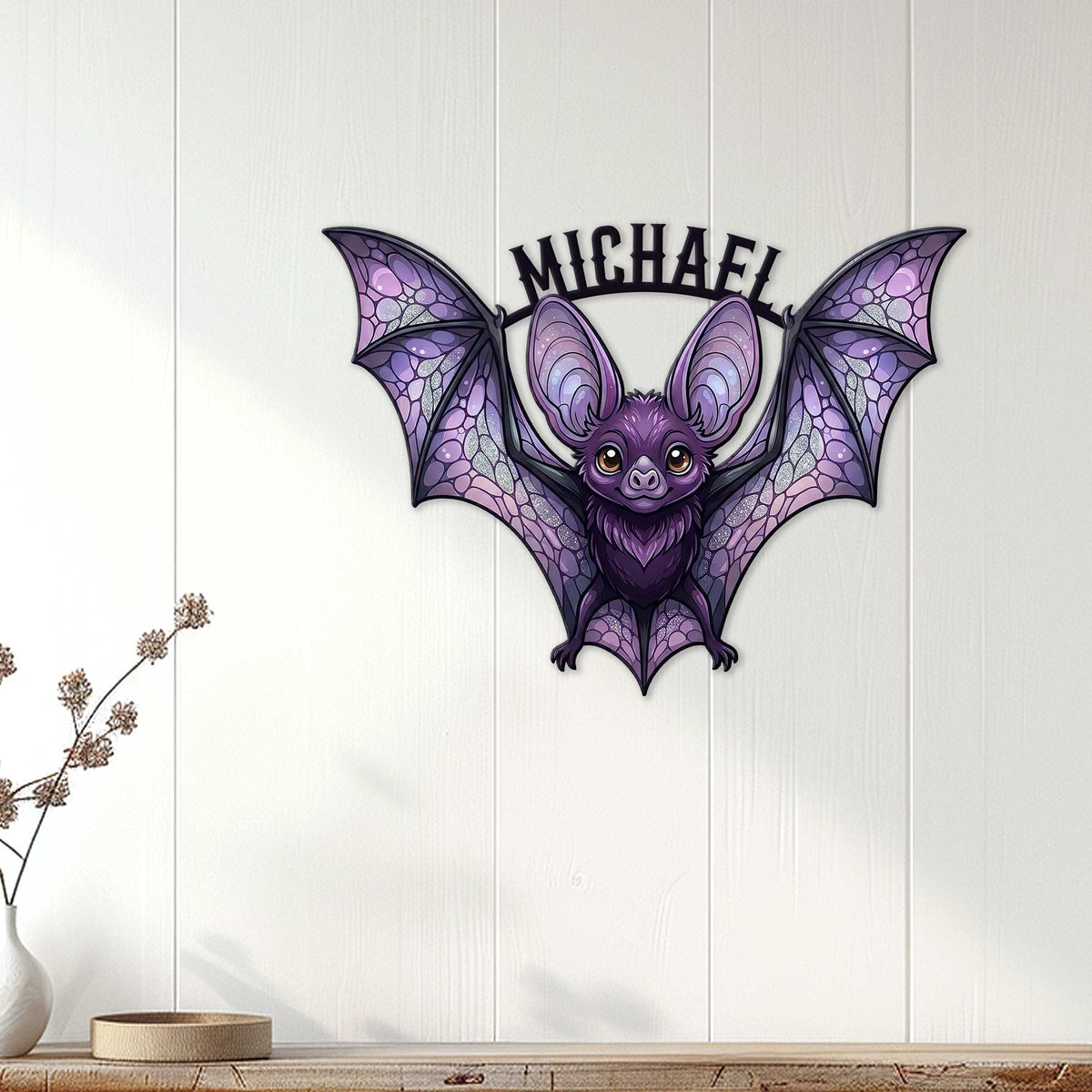 Purple stained-glass style bat wall sign displayed on a light wood-paneled interior wall