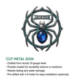 Cut metal spider sign feature graphic showing the ornate arachnid wall decor design