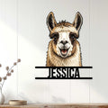 Llama wall sign displayed on a light paneled wall above a wooden console in a modern home