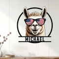 Patriotic llama wall sign displayed on a light wood-paneled wall in a home setting