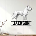 Dogo Argentino metal wall sign displayed on a light wood-paneled wall in a modern home