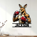 Boxing kangaroo wall sign displayed on a light wood-paneled interior wall
