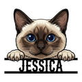 Close-up Siamese cat metal sign featuring bright blue eyes, dark facial markings, and raised paws