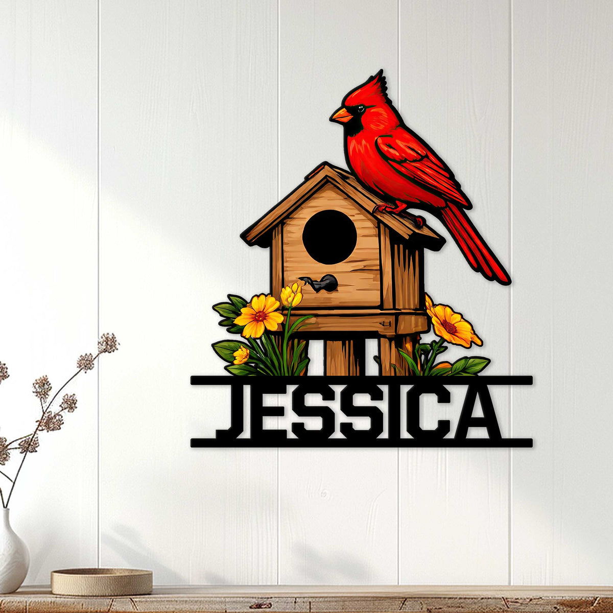 Cardinal metal wall sign displayed on a light wood-paneled wall above a console