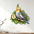 Cockatiel metal wall sign displayed on a light wood-paneled wall in a home decor setting