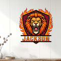 Roaring lion wall sign displayed on a light wood-paneled wall above a console table