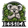 Detailed koala metal sign artwork surrounded by green eucalyptus leaves and a bold black frame