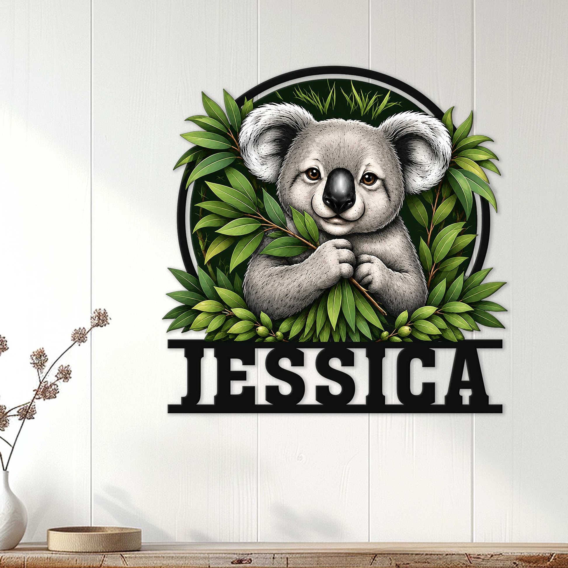 Koala wall sign displayed on a white paneled wall in a bright, nature-inspired home setting