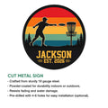 Disc golf wall sign featuring a throwing player, flying disc, basket, and cut-metal sign feature guide