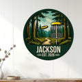 Round disc golf wall sign displayed on a bright paneled wall in a home setting