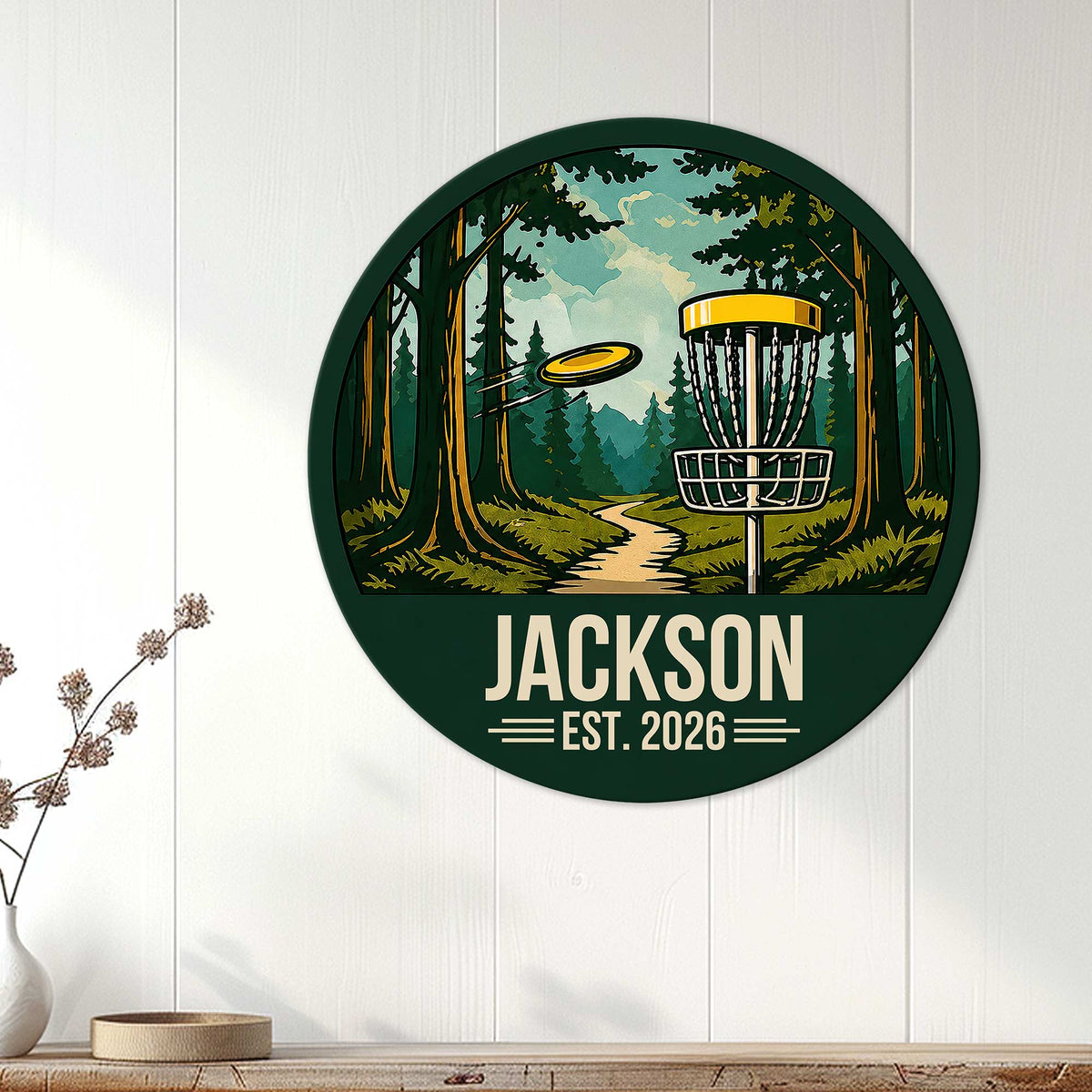 Round disc golf wall sign displayed on a bright paneled wall in a home setting