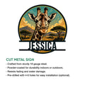 Giraffe metal sign with a bold wildlife portrait, mountain scenery, and cutout display design