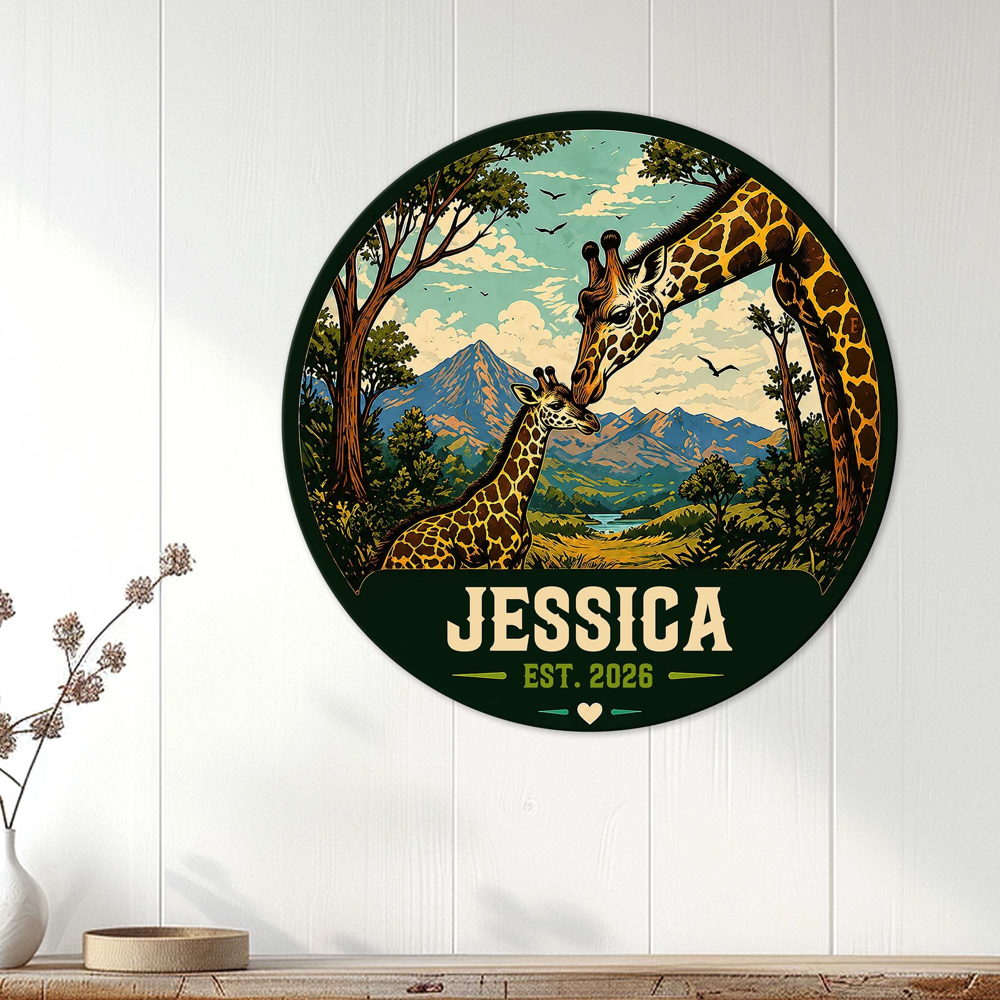 Giraffe family wall sign displayed on a white paneled wall as safari-inspired home decor