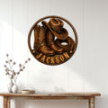 Cowboy metal sign displayed on a white paneled wall above a rustic console table
