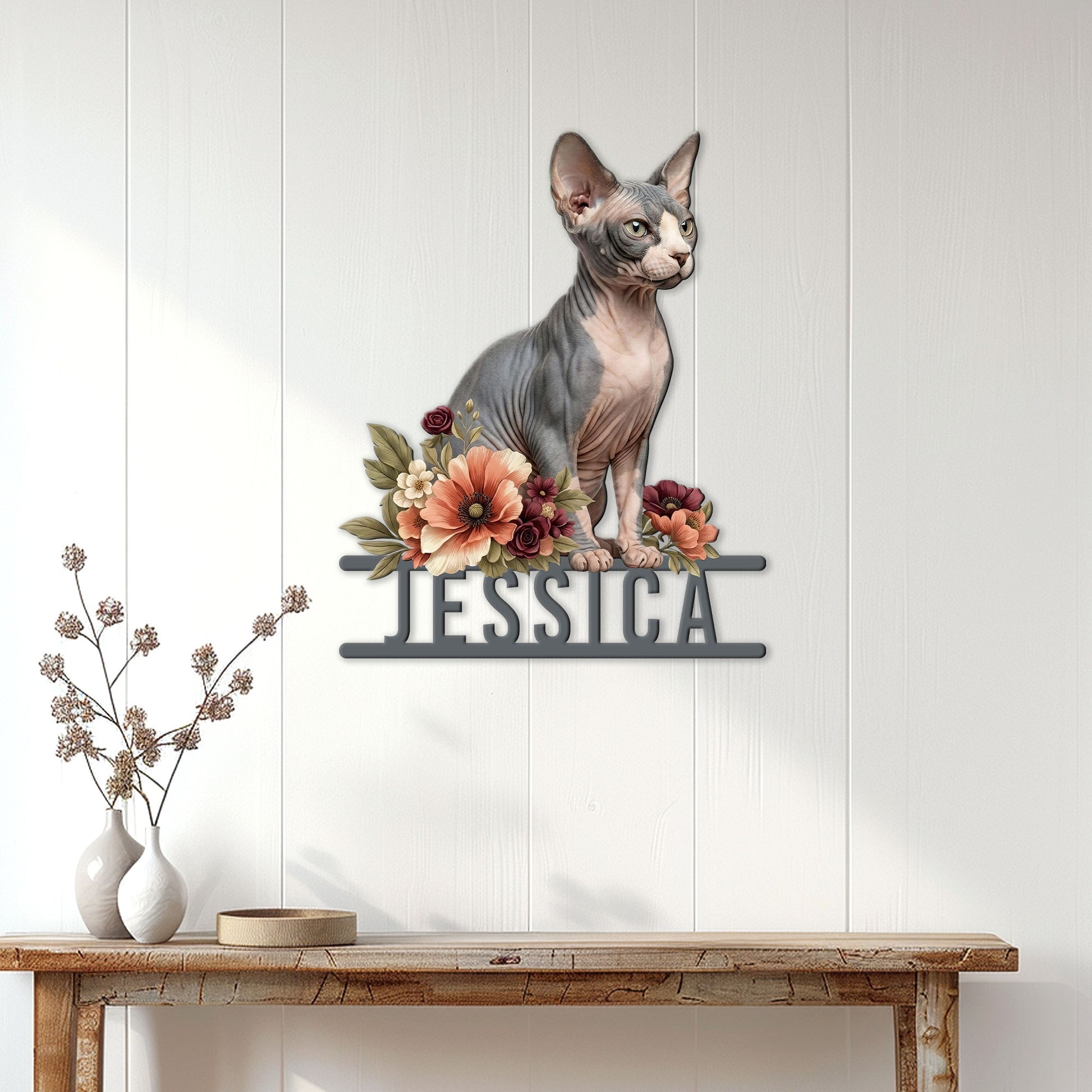 Sphynx cat metal wall sign displayed on a bright white paneled wall above a console table