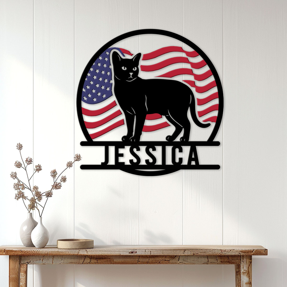 Burmese cat wall sign displayed on a white paneled wall above a rustic console table