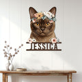 Burmese cat metal wall sign displayed on a light paneled wall above a console table