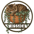 Norwegian Forest Cat metal sign featuring a fluffy sleeping cat in a terracotta planter with trailing vines