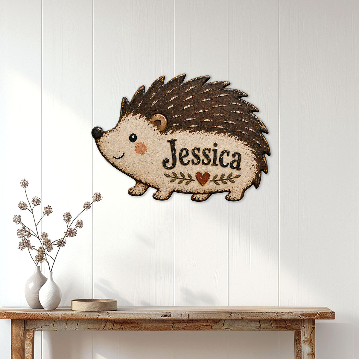 Hedgehog metal sign displayed as wall decor on white paneling above a rustic console table