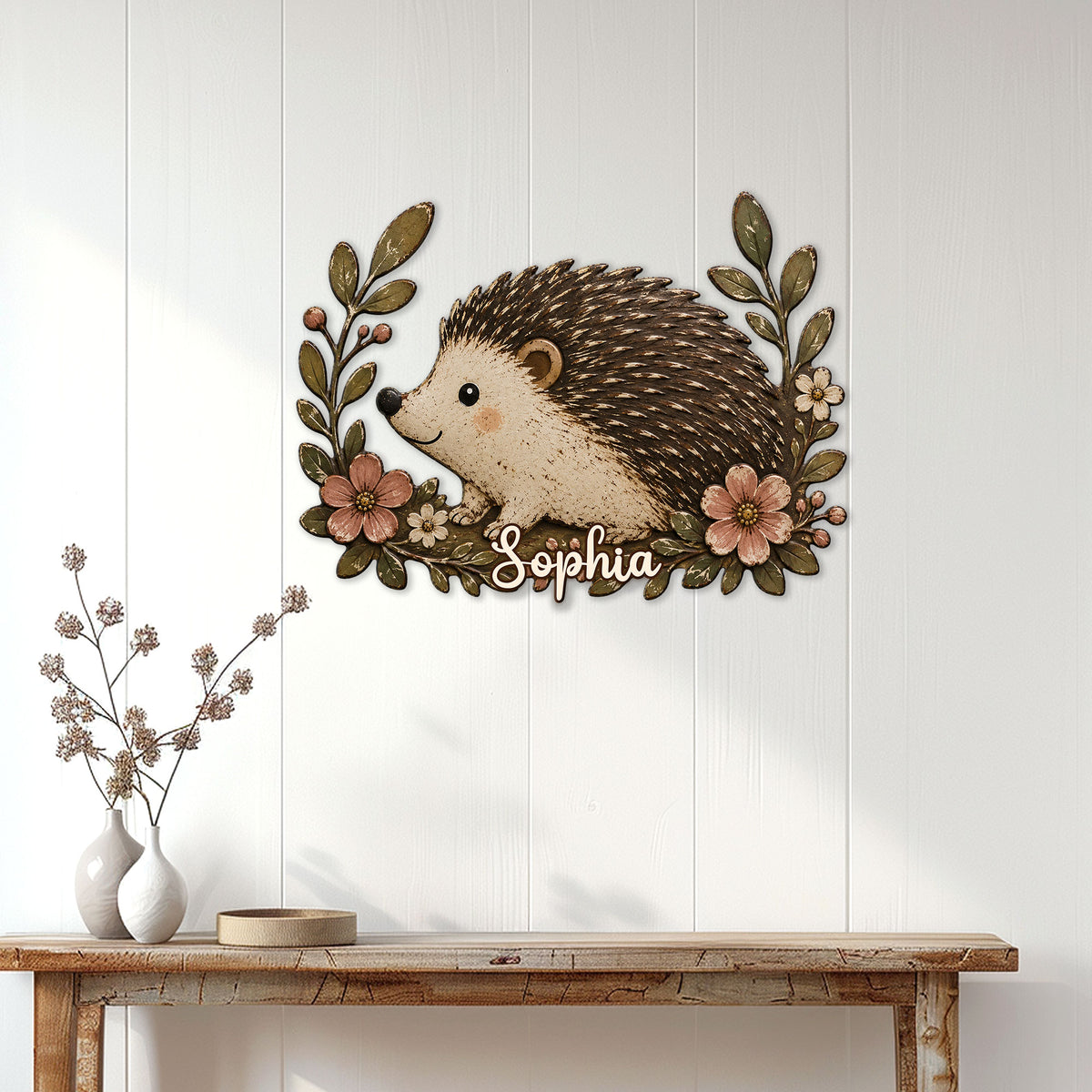 Hedgehog wall sign displayed on a white paneled wall above a rustic console table